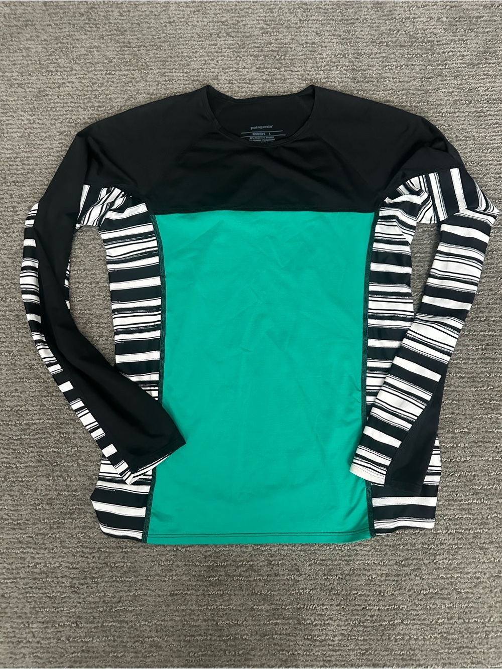 Patagonia Teal and Black Long Sleeve Women's Swim Top with Black & White Stripes
